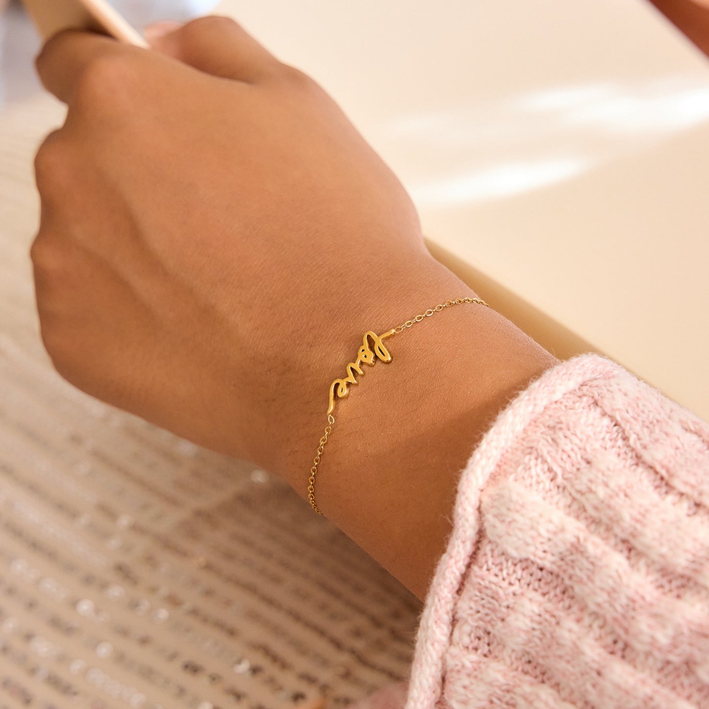 Gold 'Love' script Bracelet