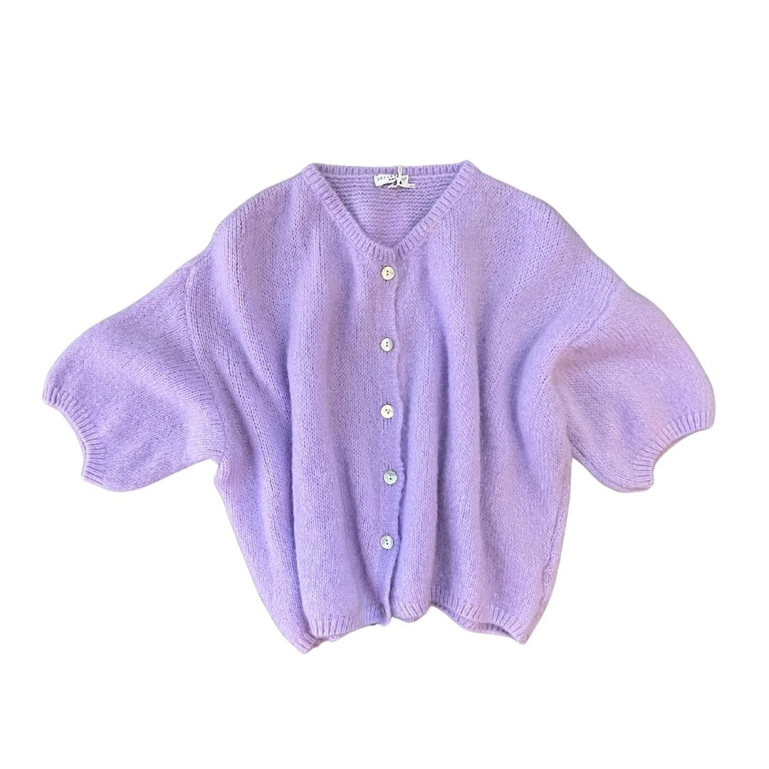 Light purple knitted cardigan with button details on a white background