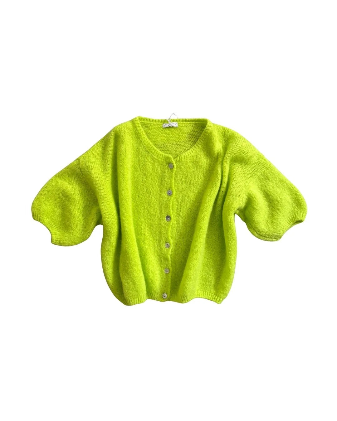 Bright green cardigan on a white background
