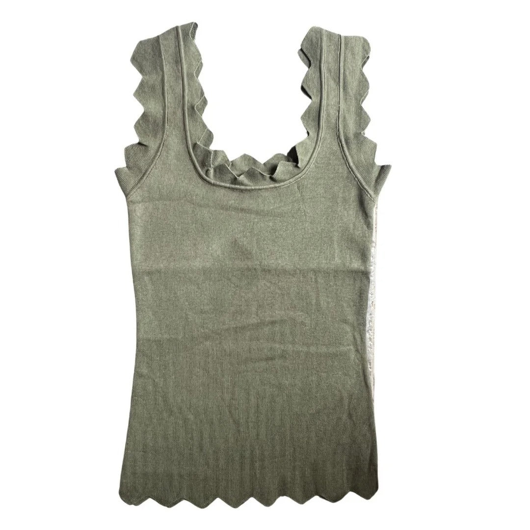Green tank top with ruffled neckline on a white background