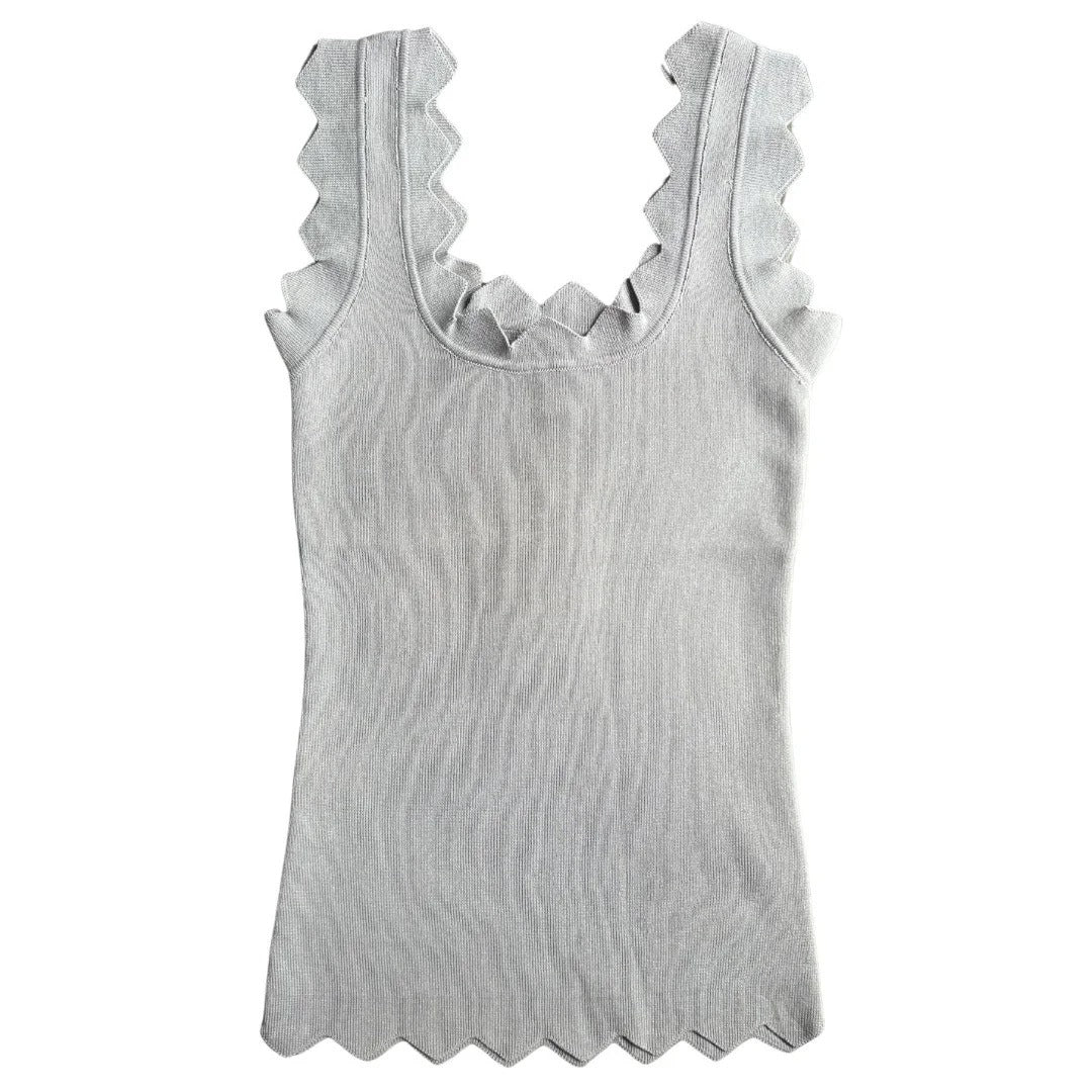 Gray tank top with ruffled trim on a white background