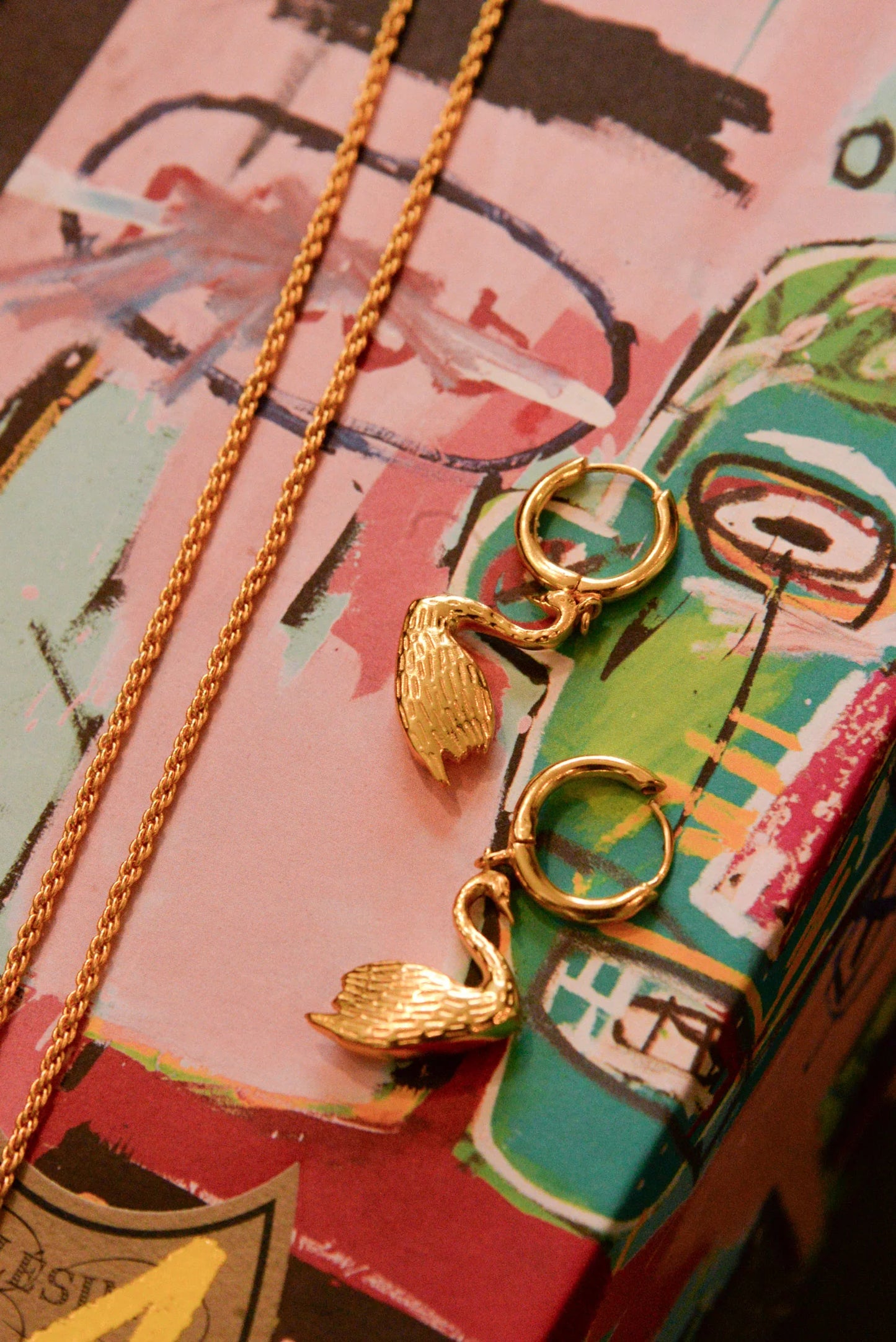 Gold Swan Huggie Hoop Earrings