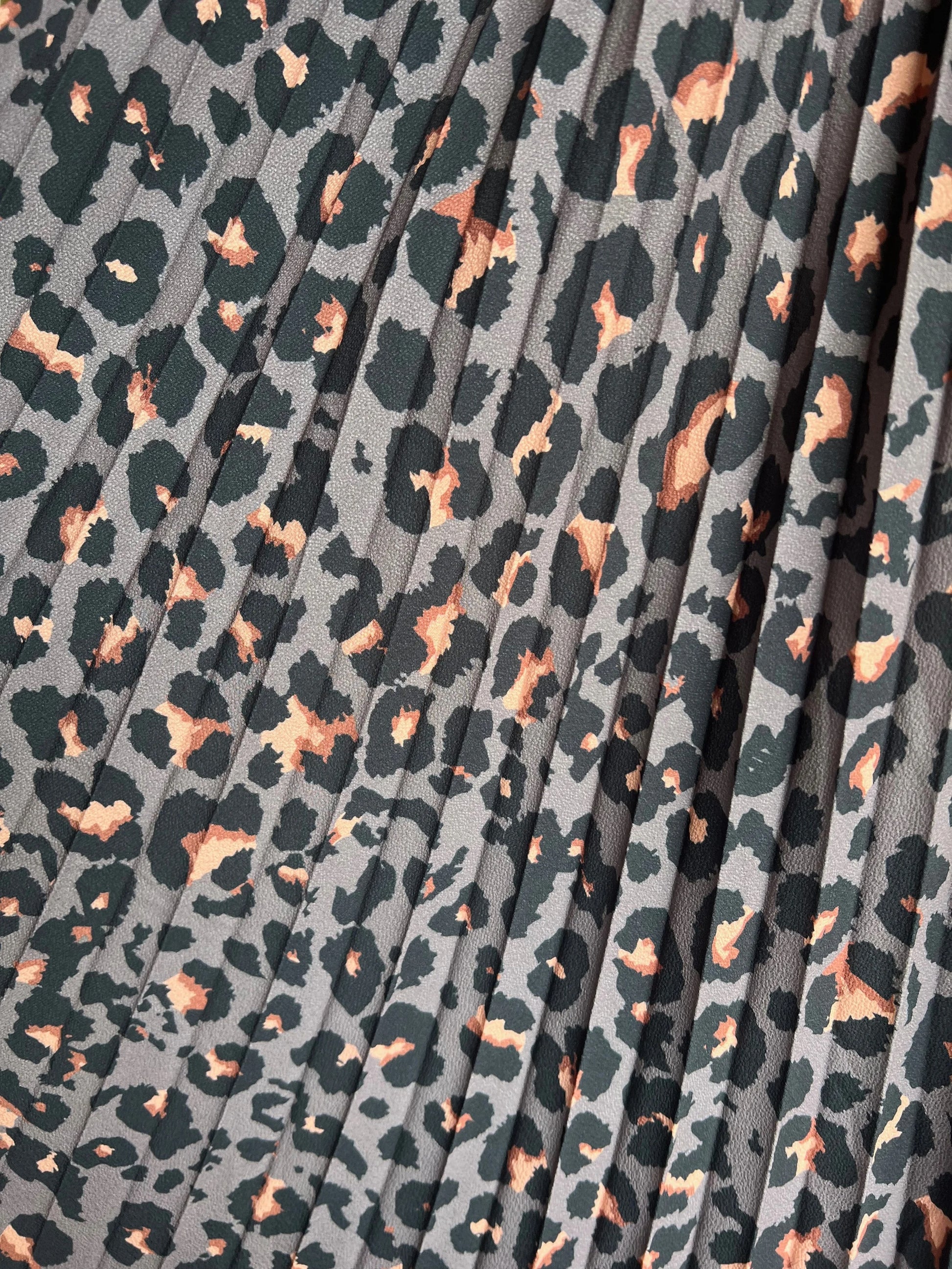 Leopard print fabric with a gray background
