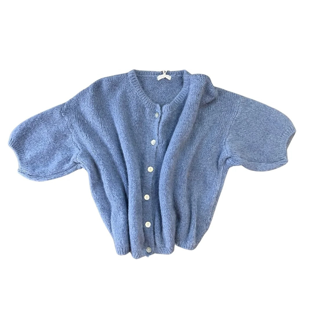 Blue knitted cardigan with short sleeves on a white background