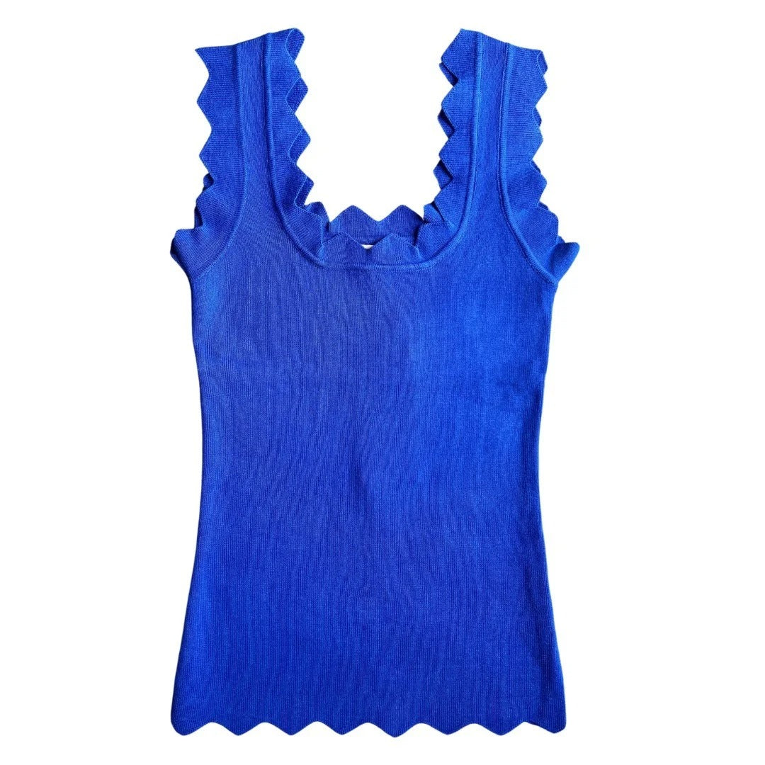 Blue tank top with ruffled neckline on a white background