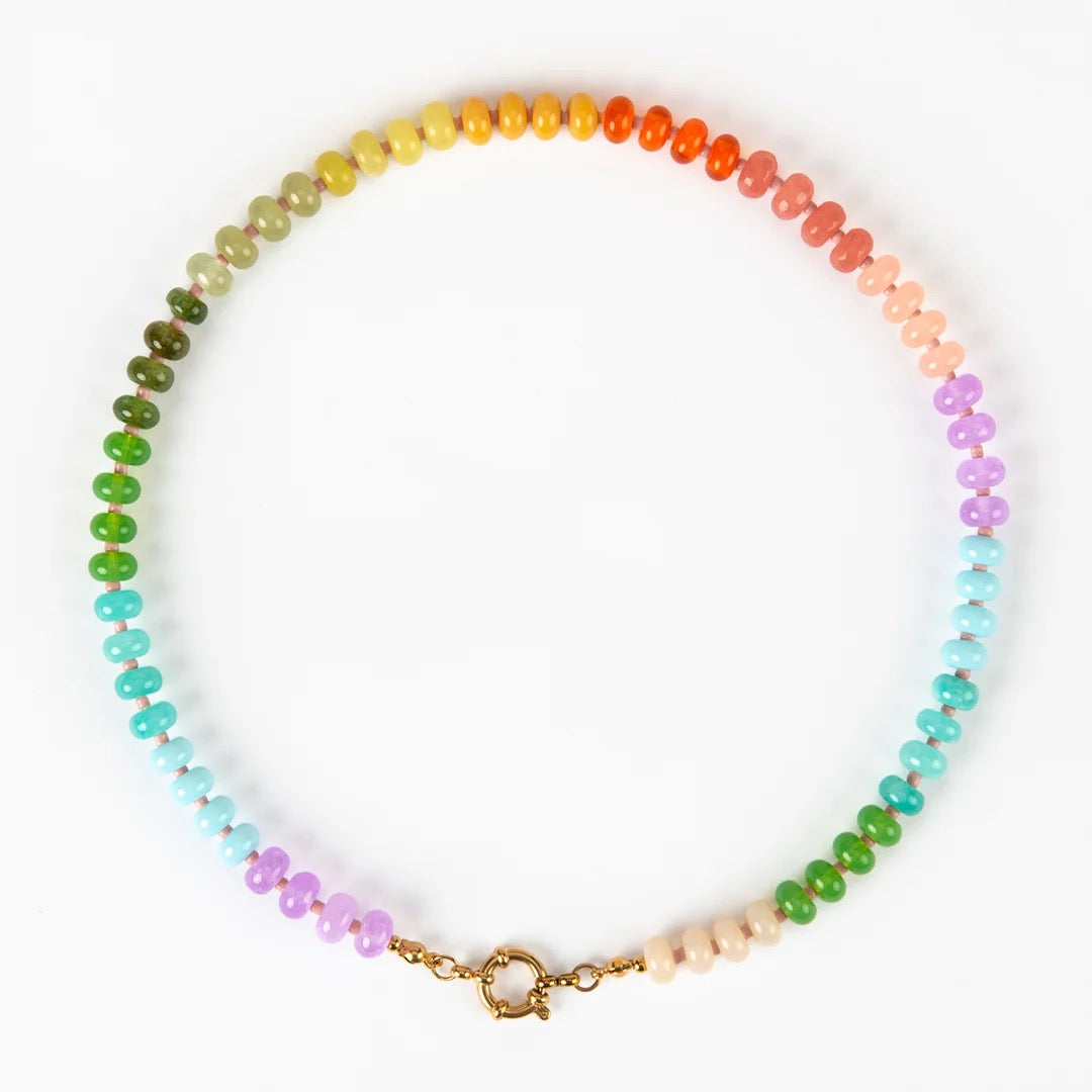 Multicolored beaded necklace with a gold clasp on a white background