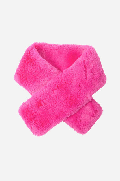Pink fluffy scarf on a light pink background