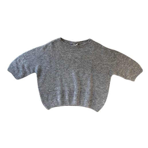 Gray cropped sweater on a white background
