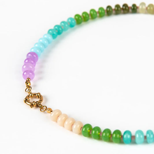 Multicolored beaded necklace with a gold clasp on a white background