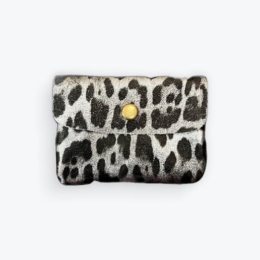 silver metallic Leopard print purse with a gold button on a white background